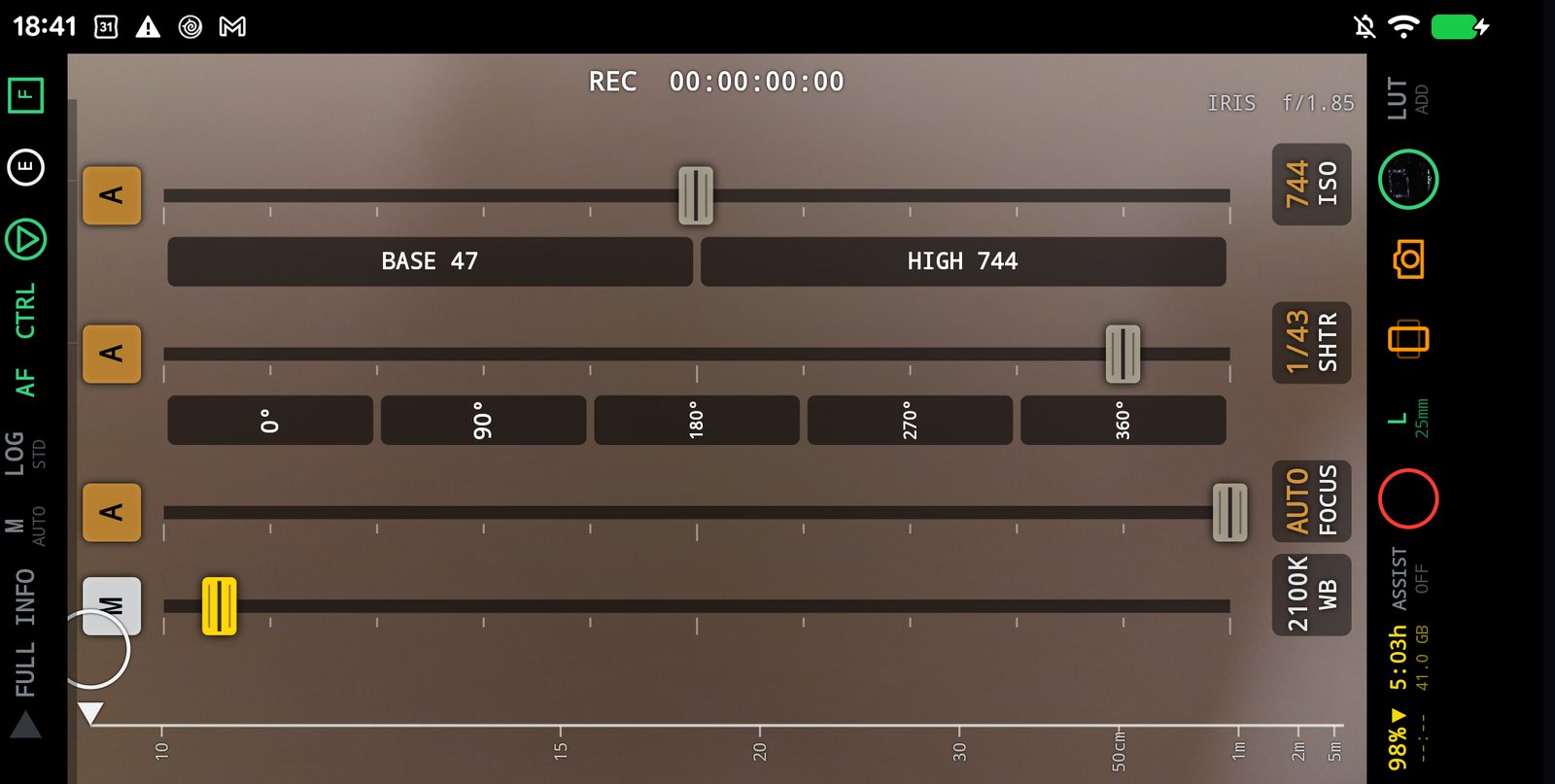 The manual faders with the phone held upright: number and name stand at each fader's end